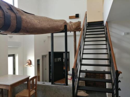 a foot on a staircase in a house at ADEGA Residências Artísticas - Perto de Lisboa in Almargem