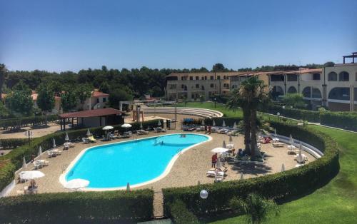 a view of a swimming pool at a resort at Residence San Bull in Metaponto
