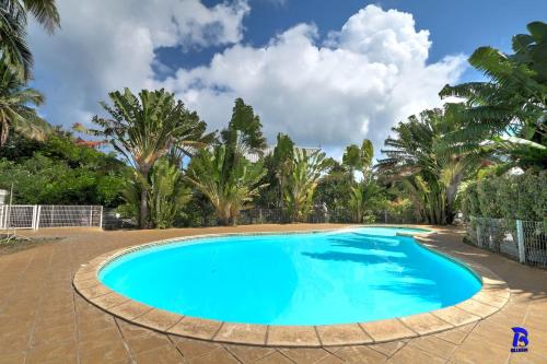 Piscine de l'établissement Appt Léo avec piscine et jardinet, 4 personnes situé à La Saline-les-bains ou située à proximité