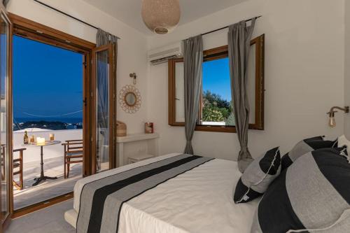 Posteľ alebo postele v izbe v ubytovaní VILLA HARMONIA I