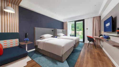 Postel nebo postele na pokoji v ubytování Holiday Inn Express Qiliping by IHG