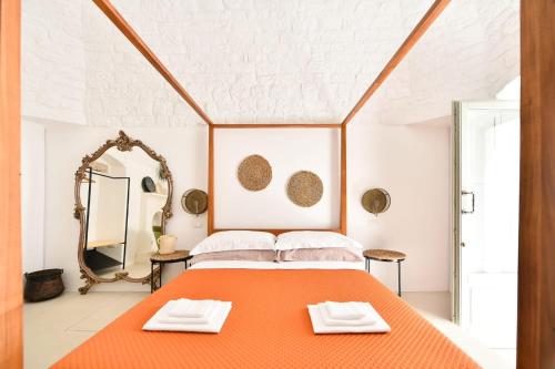 מיטה או מיטות בחדר ב-Corte Giotto Exclusive House