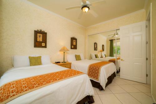 Rúm í herbergi á Los Suenos Resort Colina 5E two bedroom by Stay in CR