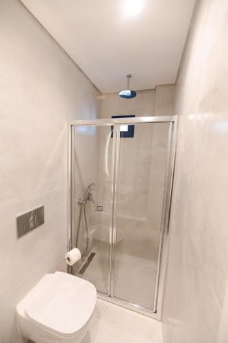 Ванная комната в Muses Apartments