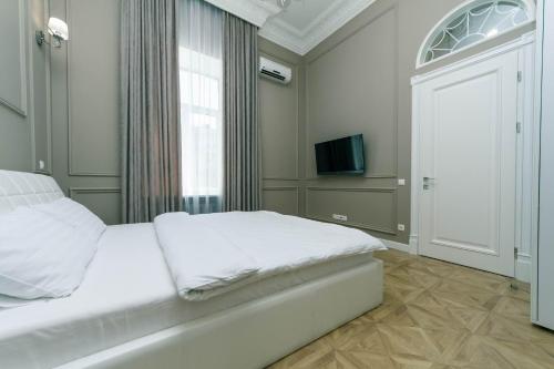 Posteľ alebo postele v izbe v ubytovaní VIP near Premier Palace & Arena city