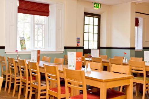 
A restaurant or other place to eat at YHA Ilam Hall
