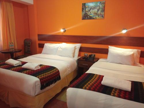 Vuode tai vuoteita majoituspaikassa Hotel Rio Dorado MachuPicchu