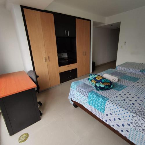 Cama o camas de una habitación en Loft Norte Cali 301