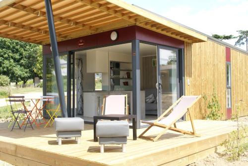 Foto Les Roulottes & Cottages du Moulin 3