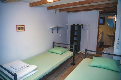 Postel nebo postele na pokoji v ubytování Bazart Vama Veche