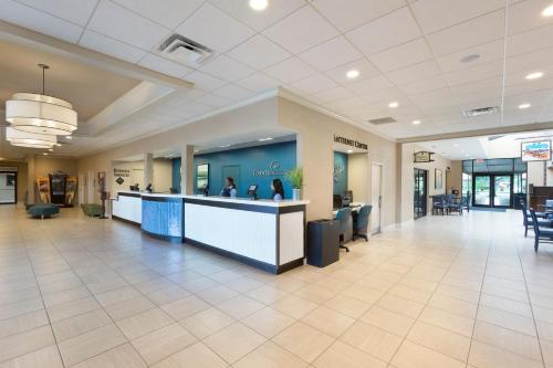 a lobby of a hospital with a reception at Rosen Inn International Near The Parks in Orlando
