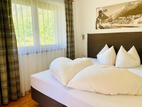 Postel nebo postele na pokoji v ubytování Haus Schuchter