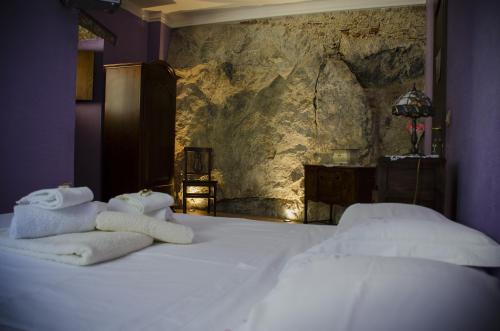 Katil atau katil-katil dalam bilik di Bed and breakfast La Sentinella