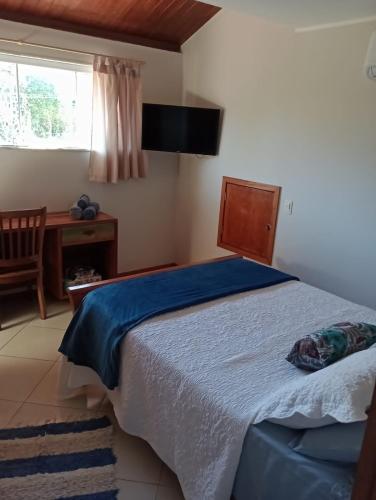 Katil atau katil-katil dalam bilik di Casa da Lu Itacoatiara -Apartamento Costão