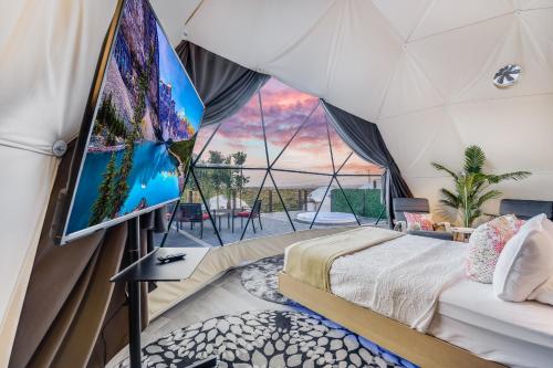 Postel nebo postele na pokoji v ubytování Udoscape Eco-Glamping Resorts