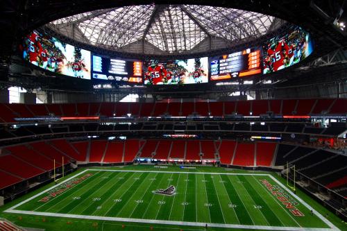 an inside view of a stadium with a football field at Holiday Inn Express & Suites Atlanta Perimeter Mall Hotel by IHG in Sandy Springs