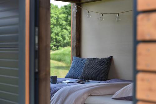Posteľ alebo postele v izbe v ubytovaní Glamping Hluboká