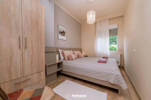Postel nebo postele na pokoji v ubytování HELIANTHOS VILLA - APARTMENT No2