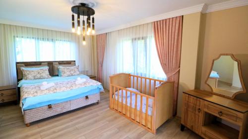 Ένα ή περισσότερα κρεβάτια σε δωμάτιο στο Luxury Nature Life Villa