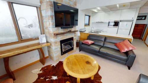 A seating area at Family Chalet 35 - The Stables Perisher