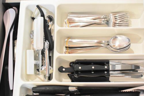 a drawer filled with utensils and silverware at B&B L'Arenaria in Pietrapertosa