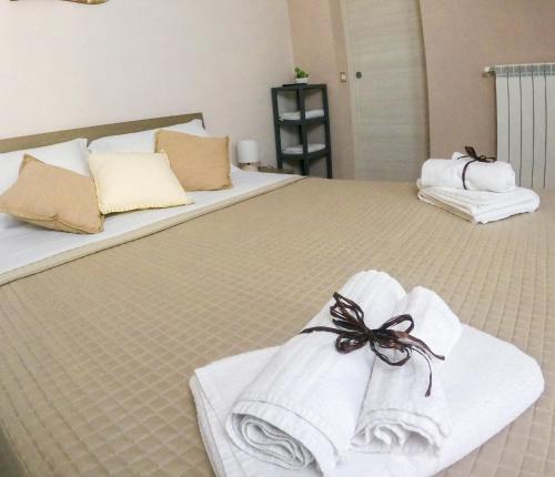 Postel nebo postele na pokoji v ubytování B&B L'Arenaria