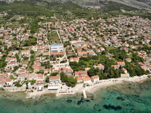 an aerial view of a town on the beach at Apartments Vidic in Orebić
