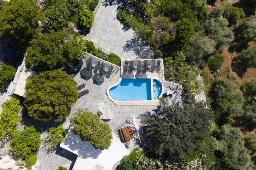 an overhead view of an estate with a swimming pool at Kefali Villa, eco tourism experience, By ThinkVilla in Atsipádhes