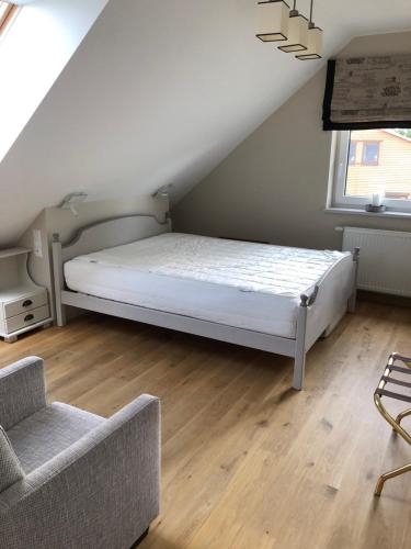 Posteľ alebo postele v izbe v ubytovaní Apartament na Podlasiu