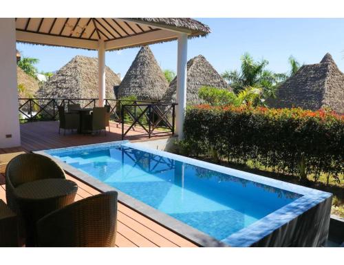Majoituspaikassa Safari Hotel and Villas powered by Cocotel tai sen lähellä sijaitseva uima-allas