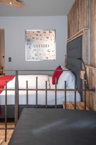 Cama o camas de una habitación en Hotel Astrid - Ski In - Ski Out