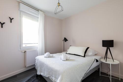 Posteľ alebo postele v izbe v ubytovaní DIFY Elegant - Quartier Part Dieu