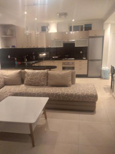 Kuchyň nebo kuchyňský kout v ubytování Appartement au Bord de la Mer