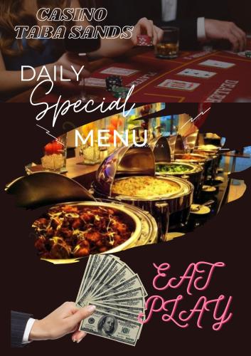 a picture of a table of food with a fan at Taba Sands Hotel & Casino in Taba