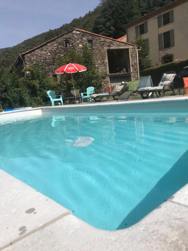 Bazén v ubytování Le grenier de l Aigoual nebo v jeho okolí