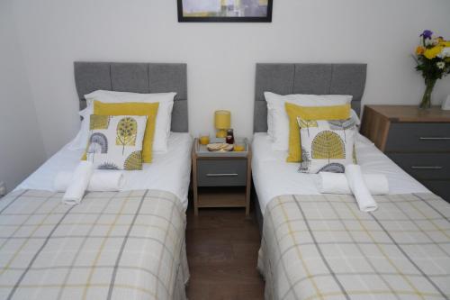 Cama o camas de una habitación en 2BedRm-4guests-Parking-NearStation