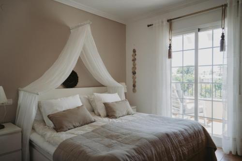 Postel nebo postele na pokoji v ubytování AP378 Casa Maria