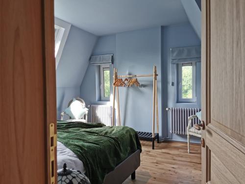 מיטה או מיטות בחדר ב-Kasteel Ryckevelde