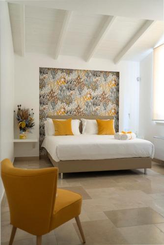 Postel nebo postele na pokoji v ubytování Otto Apulia House B&B