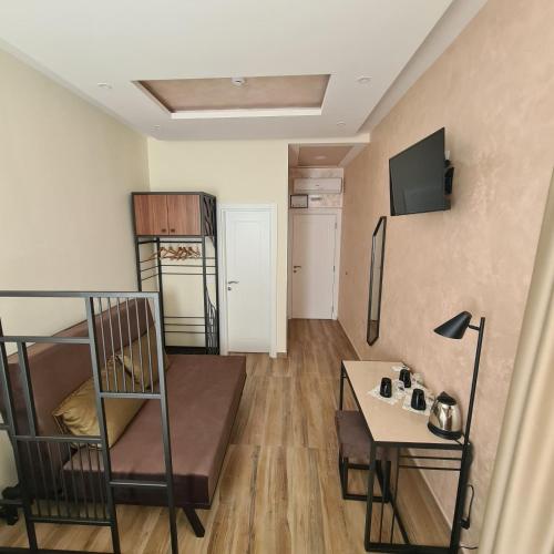 Televisyen dan/atau pusat hiburan di Up Hostel
