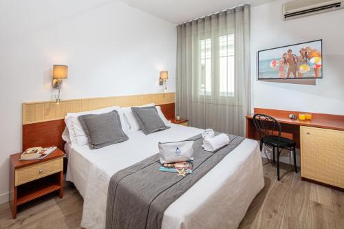 Postel nebo postele na pokoji v ubytování Hotel Villa d'Este