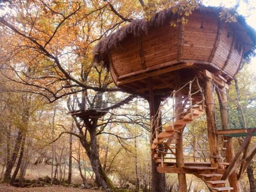 a tree house in a tree at Les Cabanes De Pyrene in Cazarilh