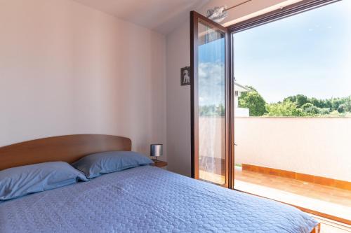Posteľ alebo postele v izbe v ubytovaní Apartment Zadar