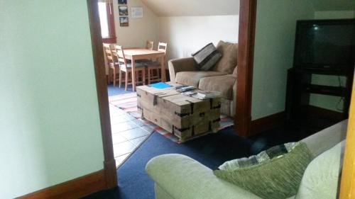 a living room filled with boxes and a tv at Bon Homme View in Jasper