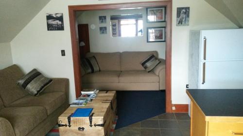 a living room with a couch and a table at Bon Homme View in Jasper