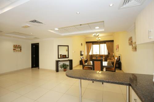 a lobby of a hospital with a waiting room at Ivory Grand Hotel Apartments in Dubai