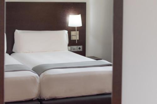 Katil atau katil-katil dalam bilik di Hotel Alda Zaragoza Independencia
