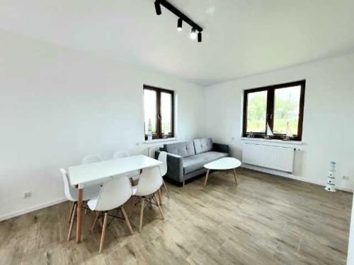 Χώρος καθιστικού στο Apartamenty Mazury