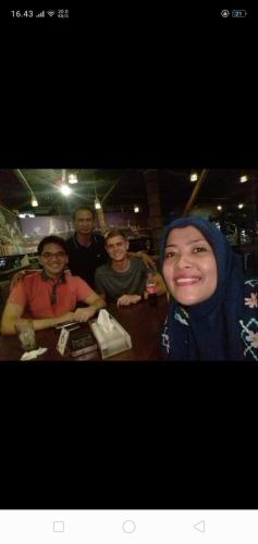 a group of people sitting at a table at Belitung Backpacker in Tanjungpandan