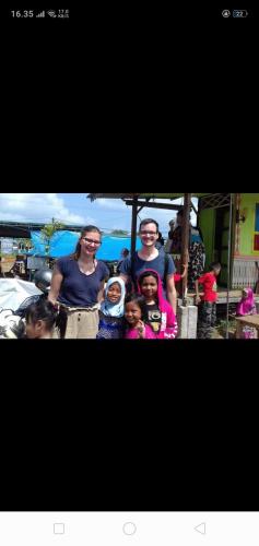 a group of people standing next to each other at Belitung Backpacker in Tanjungpandan